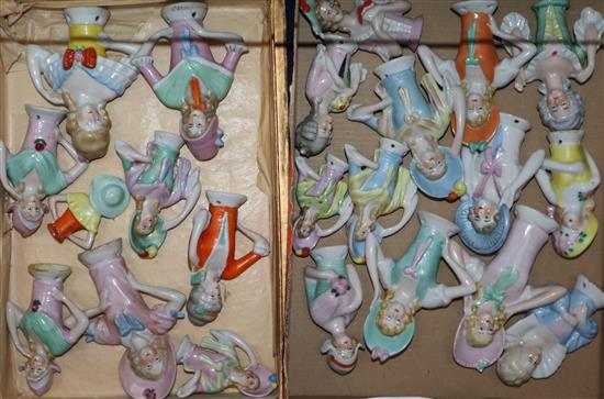 Two boxes of assorted open arm pin dollies